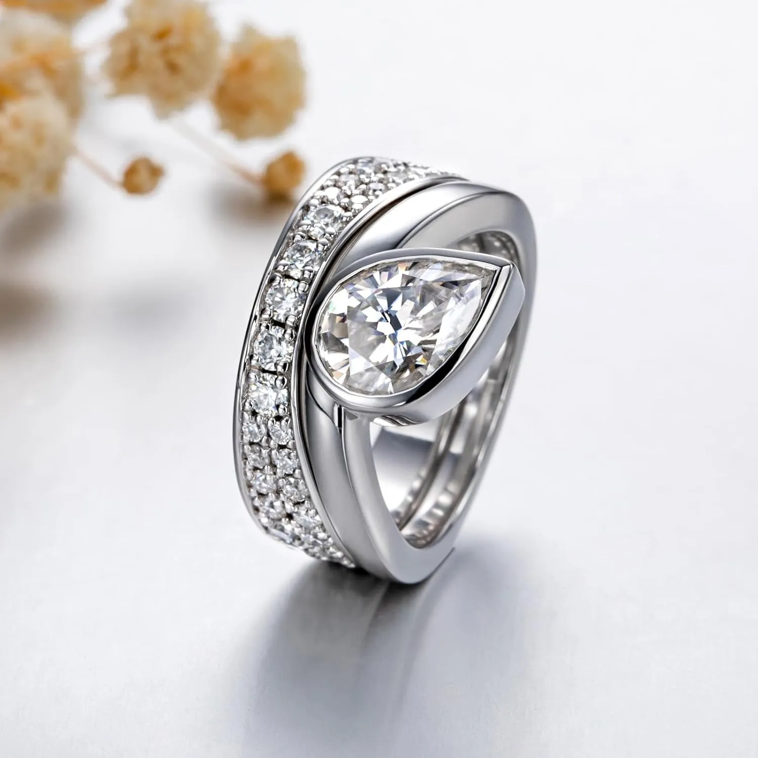 Womens 2.5 Carat Crushed Ice Cut Pear Moissanite Bezel Ring with Curved Guard Wrap Enhancer for Engagement Anniversary Rings Platinum-Plated Silver Channel Eternity Wedding Band Bridal Set