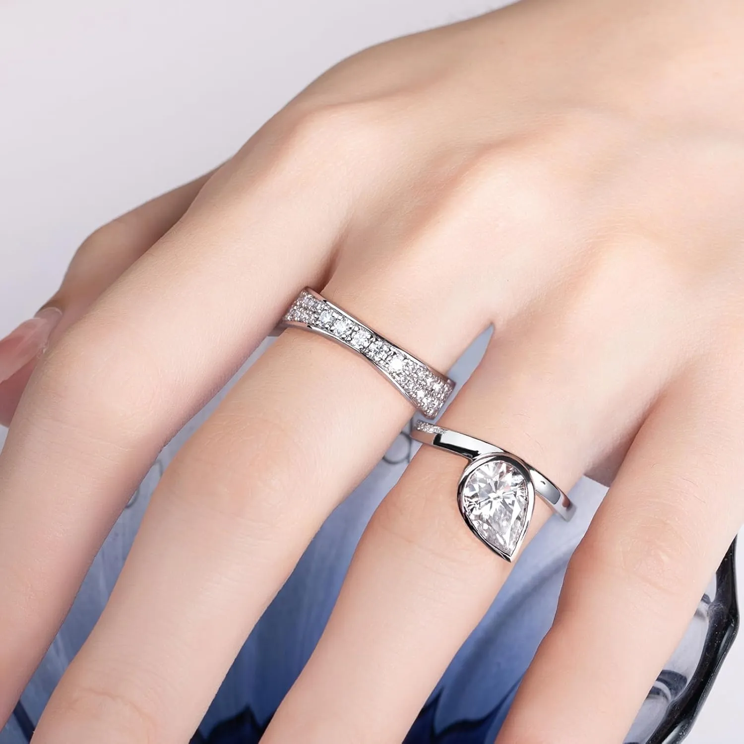 Womens 2.5 Carat Crushed Ice Cut Pear Moissanite Bezel Ring with Curved Guard Wrap Enhancer for Engagement Anniversary Rings Platinum-Plated Silver Channel Eternity Wedding Band Bridal Set