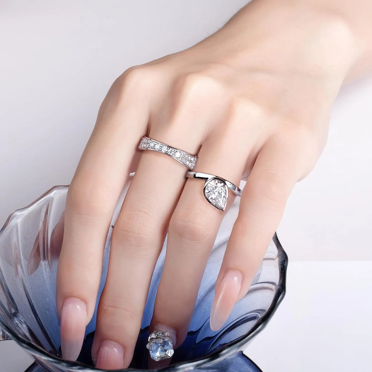 Womens 2.5 Carat Crushed Ice Cut Pear Moissanite Bezel Ring with Curved Guard Wrap Enhancer for Engagement Anniversary Rings Platinum-Plated Silver Channel Eternity Wedding Band Bridal Set