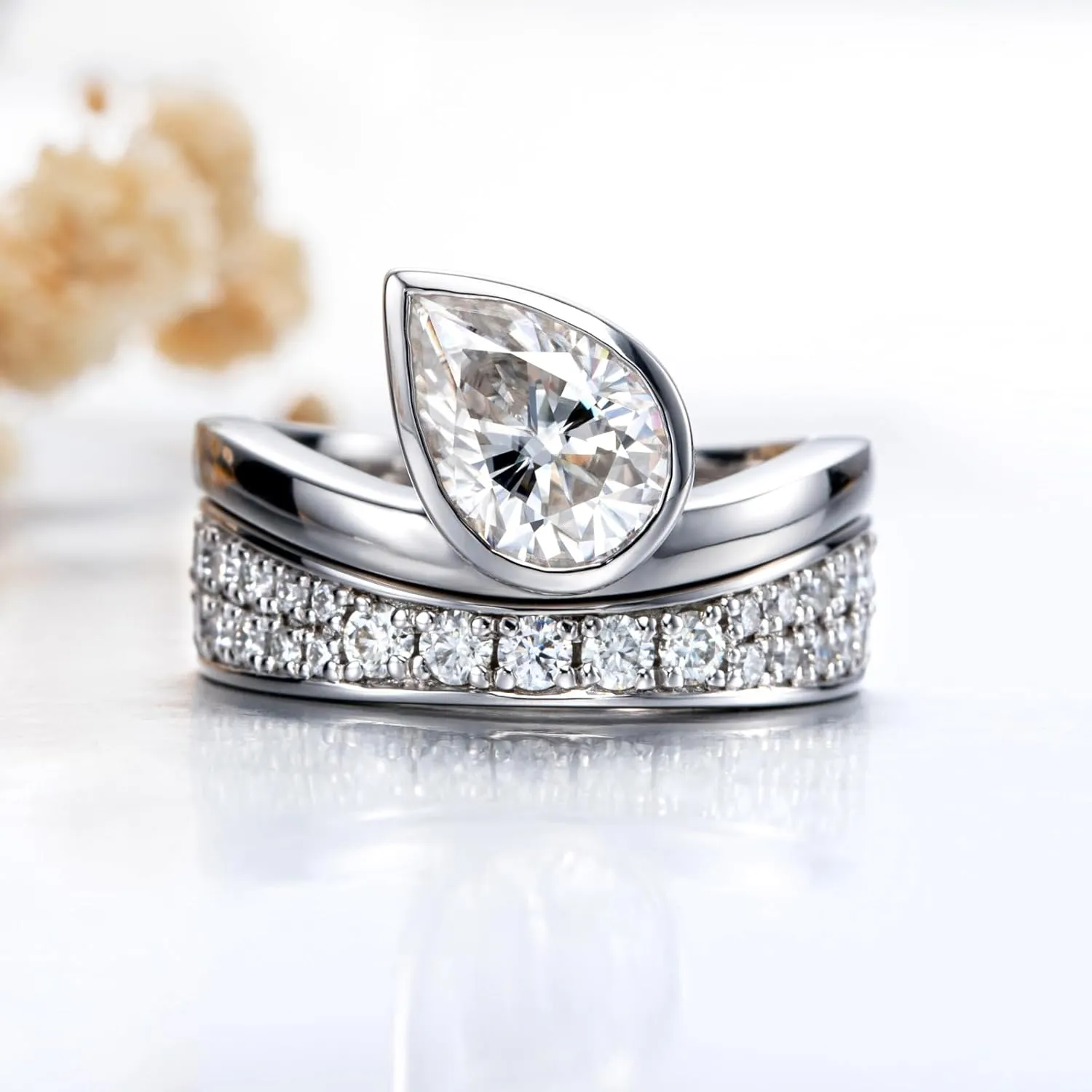 Womens 2.5 Carat Crushed Ice Cut Pear Moissanite Bezel Ring with Curved Guard Wrap Enhancer for Engagement Anniversary Rings Platinum-Plated Silver Channel Eternity Wedding Band Bridal Set